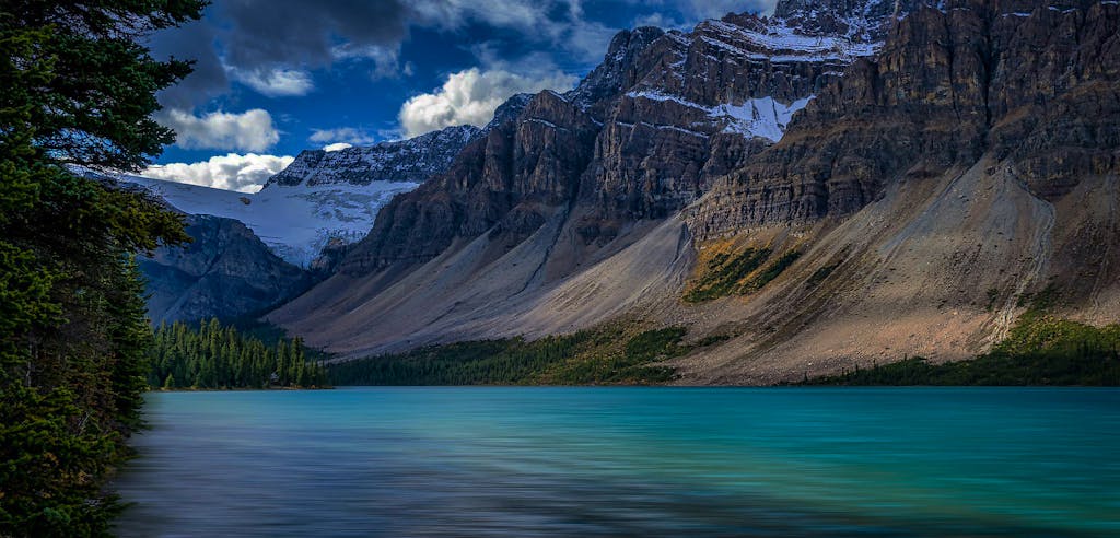 Stunning alpine lake in the Canadian Rockies with glaciers and mountains