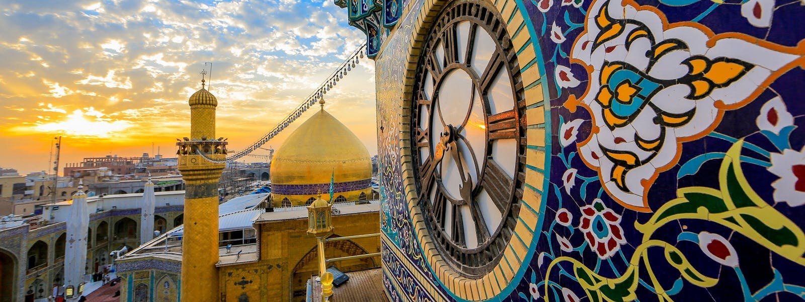 An adventure in Iran, exploring the captivating architecture of a building with a majestic clock.